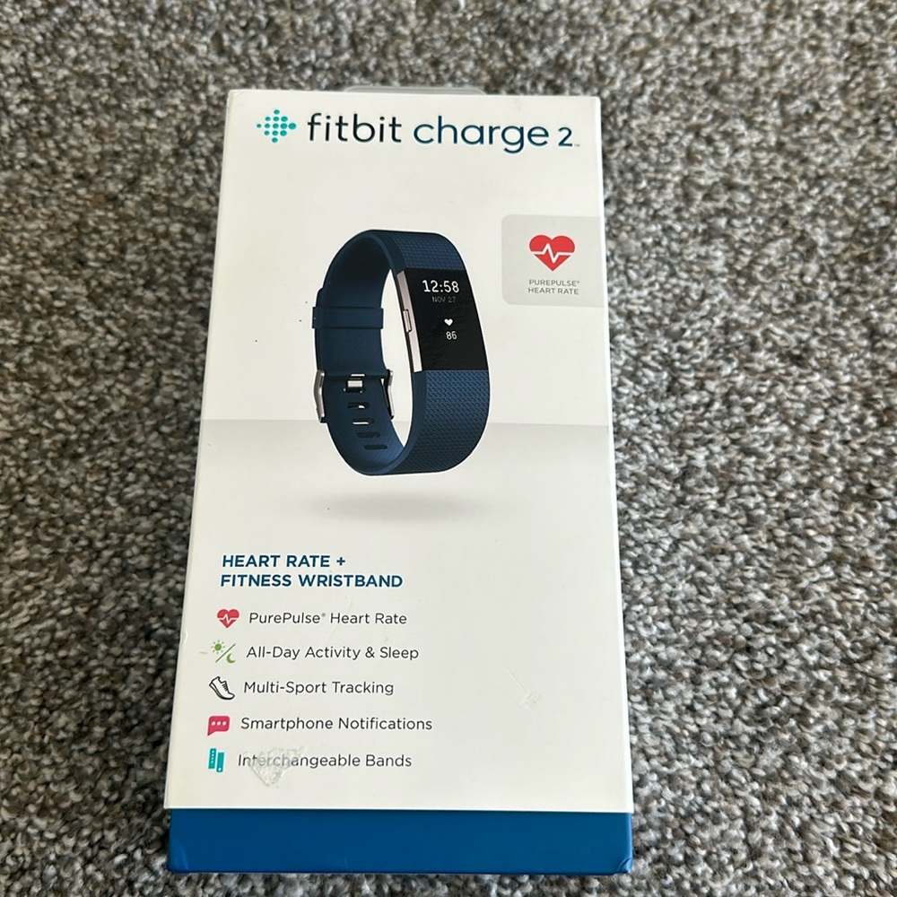 Brand new in box. Never used Fitbit Charge 2.